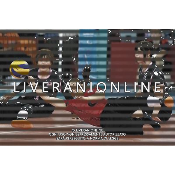 (120901) -- LONDON, Sept. 1, 2012 () -- Sachie Awano of Japan saves the ball during the women\'s sitting volleyball preliminary round Pool A match against the Netherlands at London 2012 Paralympic Games in London, Aug. 31, 2012. Japan lost the match 1-3. (/Chen Yehua) AG ALDO LIVERANI S A S ONLY ITALY