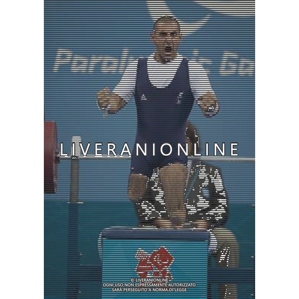 (120901) -- LONDON, Sept. 1, 2012 () -- Ali Jawad of Britain celebrates during the men\'s -56kg powerlifting final at London 2012 Paralympic Games in London, Aug. 31, 2012. (/Lui Siu Wai) AG ALDO LIVERANI S A S ONLY ITALY