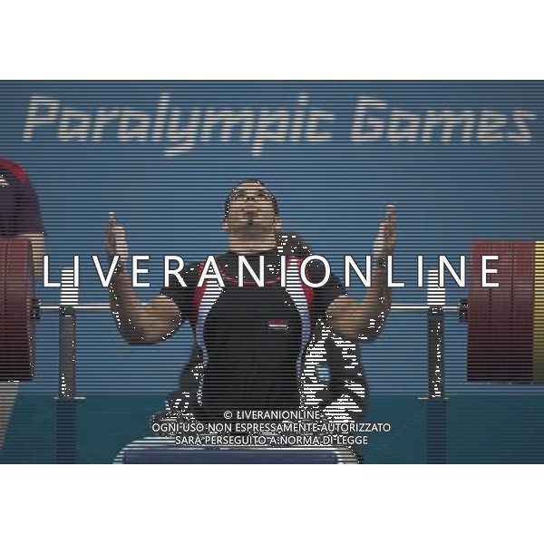 (120901) -- LONDON, Sept. 1, 2012 () -- Gold medalist Sherif Othman of Egypt gestures during the men\'s -56kg powerlifting final at London 2012 Paralympic Games in London, Aug. 31, 2012. (/Lui Siu Wai) AG ALDO LIVERANI S A S ONLY ITALY