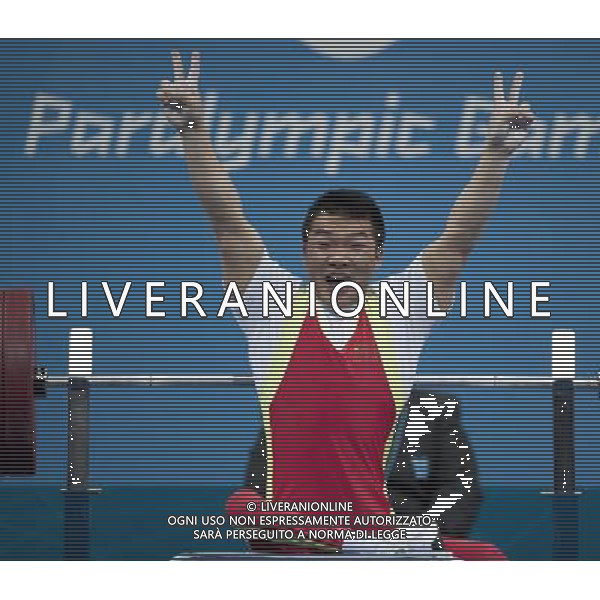 (120901) -- LONDON, Sept. 1, 2012 () -- Gold medalist Feng Qi of China celebrates during the awarding ceremony for the men\'s -52kg powerlifting final at London 2012 Paralympic Games in London, Aug. 31, 2012. (/Lui Siu Wai) AG ALDO LIVERANI S A S ONLY ITALY