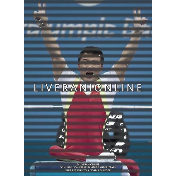 (120901) -- LONDON, Sept. 1, 2012 () -- Gold medalist Feng Qi of China celebrates during the men\'s -52kg powerlifting final at London 2012 Paralympic Games in London, Aug. 31, 2012. (/Lui Siu Wai) AG ALDO LIVERANI S A S ONLY ITALY