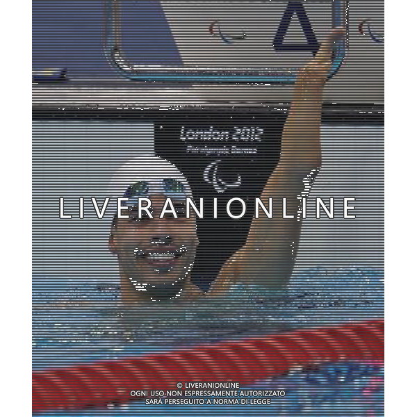(120902) -- LONDON, Sept. 2, 2012 () -- Dias Daniel of Brazil reacts after winning the Men\'s 200m Freestyle - S5 final at London 2012 Paralympic Games, in London, Britain, on Sept. 1, 2012. Daniel won the gold medal with a time of 2 minutes 27.83 seconds. (/Yang Shiyao) (cc) AG ALDO LIVERANI S A S ONLY ITALY