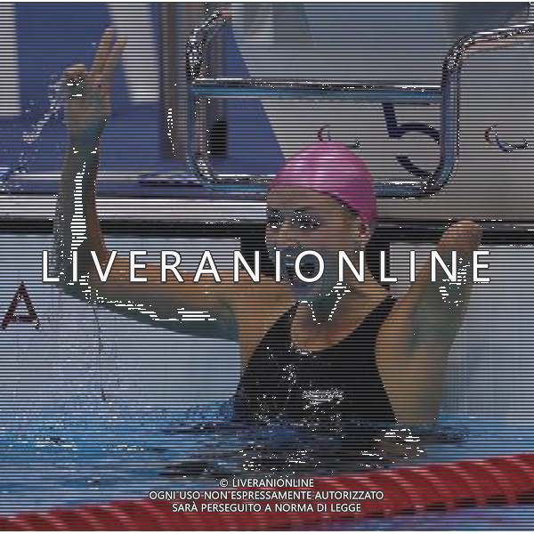 (120902) -- LONDON, Sept. 2, 2012 () -- Olesya Vladykina of Russia reacts after winning the Women\'s 100m Breaststroke - SB8 final at London 2012 Paralympic Games in London, Britain, on Sept. 1, 2012. Vladykina won the gold medal and set a new world record of 1 minute 17.17 seconds. (/ Yang Shiyao) (cc) AG ALDO LIVERANI S A S ONLY ITALY