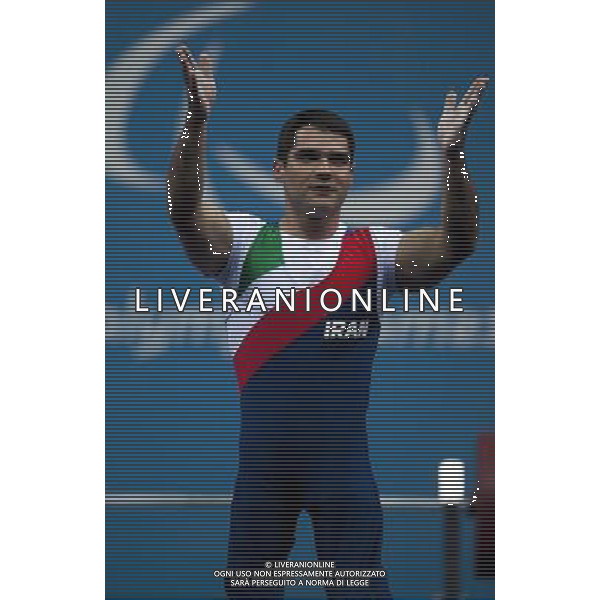 (120902) -- LONDON, Sept. 2, 2012 () -- Nader Moradi of Iran reacts after winning the Men\'s 60 kg final of the Powerlifting event at London 2012 Paralympic Games in London, Britain, on Sept. 1, 2012. Moradi won the gold medal with 196kg. (/Lui Siu Wai) (cc) AG ALDO LIVERANI S A S ONLY ITALY