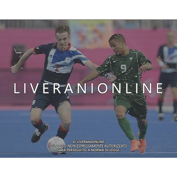 (120902) -- LONDON, Sept. 2, 2012 () -- Da Costa Silver Luciano (R) of Brazil vies the ball with Blair Glynn of Britain during the Men\'s Football 7-a-side match at London 2012 Paralympic Games, in London, Britain, on Sept. 1, 2012. Brzil won 3-0. (/Li Jundong) (cc) AG ALDO LIVERANI S A S ONLY ITALY