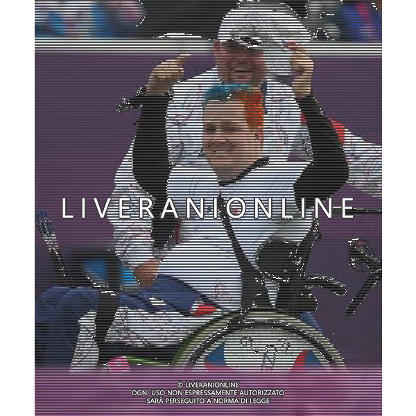 (120902) -- LONDON, Sept. 2, 2012 () -- David Drahoninsky of the Czech Republic gestures after winning the Men\'s Individual Compound - W1 Quarterfinals against Fabio Azzolini of Italy, at London 2012 Paralympic Games, in London, on Sept. 1, 2012. Drahoninsky won 6-5, and advanced to the semifinals. (/Wang Lili) (cc) AG ALDO LIVERANI S A S ONLY ITALY