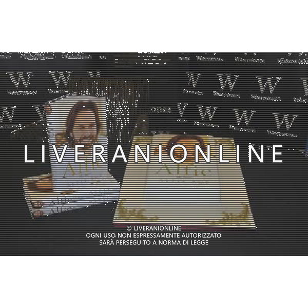 Alfie Boe\'s new book \'Alfie My Story\' and a cake made by \'Little Bird\'s Cake Boutique\' in Ipswich to celebrate the launch of Alfie Boe\'s new book at Waterstones, Bluewater Shopping Centre, Greenhithe, Kent on Saturday 1 September 2012. AG ALDO LIVERANI S A S ONLY ITALY