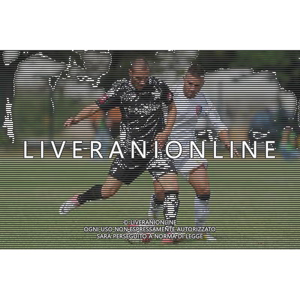 Campionato Lega PRO 2Á Divisione Girone A - 1Á Giornata Casale Monferrato (AL) 2-09-2012 Casale - Milazzo nella foto: Nicholas Siega (Casale) e sulla DX Giuseppe Di Pasquale (Milazzo) foto Roberto Garavaglia - ag. Aldo Liverani sas