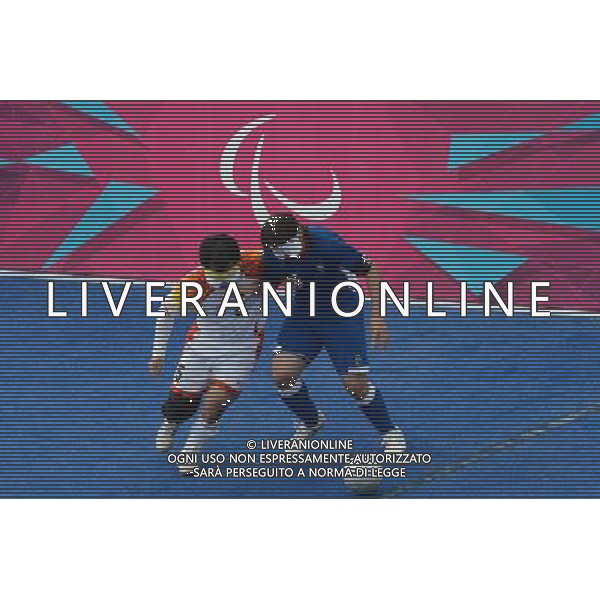 (120902) -- LONDON, Sept. 2, 2012 () -- Li Xiaoqiang (L) of China competes during the Pool B preliminary of Men\'s football 5-a-side against France at the London 2012 Paralympic Games in London, Britain, Sept. 2, 2012. The match ended with 0-0 draw. (/Cheong Kam Ka ) (lm) PHOTOSHOT/AG ALDO LIVERANI SAS - ITALY ONLY -