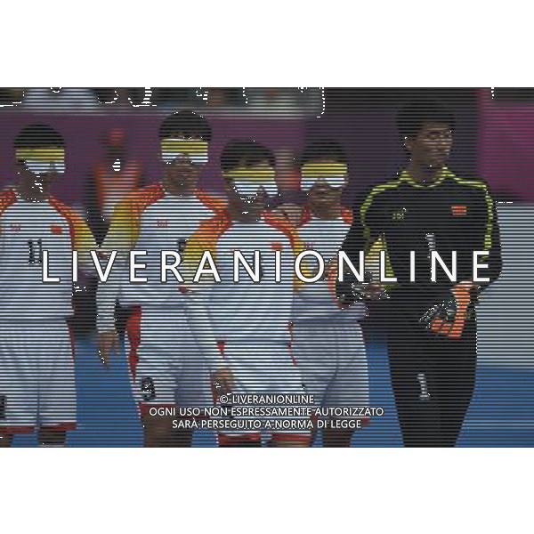 (120902) -- LONDON, Sept. 2, 2012 () -- Players of China enter the court before the Pool B preliminary of Men\'s football 5-a-side against France at the London 2012 Paralympic Games in London, Britain, Sept. 2, 2012. The match ended with 0-0 draw. (/Li Jundong) (lm) PHOTOSHOT/AG ALDO LIVERANI SAS - ITALY ONLY -