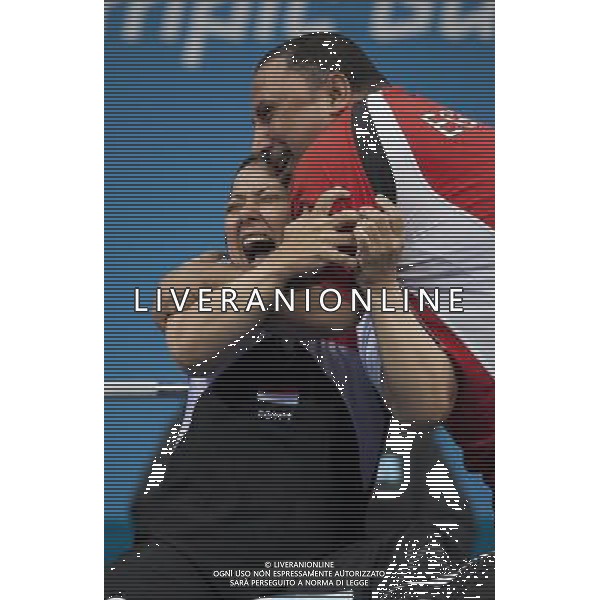 (120902) -- LONDON, Sept. 2, 2012 () -- Fatma Omar (L) of Egypt celebrates for victory during the women\'s 56kg final of powerlifting competition at the London 2012 Paralympic Games in London, Britain, Sept. 2, 2012. Fatma Omarb won the gold with 142kg. (/Lui Siu Wai) (lm) PHOTOSHOT/AG ALDO LIVERANI SAS - ITALY ONLY -