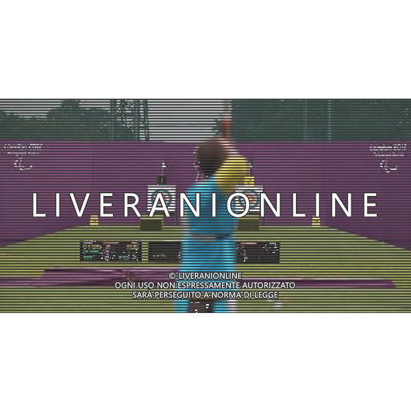 (120902) -- LONDON, Sept. 2, 2012 () -- Yuriy Kopiy of Ukraine competes during the quarterfinals of the Men\'s Individual Recurve - Standing of archery competition against Mikhail Oyun of Russia at the London 2012 Paralympic Games in London, Britain, Sept. 2, 2012. Yuriy Kopiy lost 2-6. (/Wang Lili) (lm) PHOTOSHOT/AG ALDO LIVERANI SAS - ITALY ONLY -