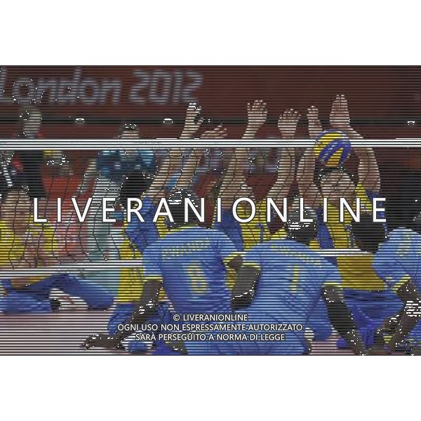 (120902) -- LONDON, Sept. 2, 2012 () -- Players (above) of China compete during the Pool B preliminary round of men\'s sitting volleyball against Rwanda at the London 2012 Paralympic Games in London, Britain, Sept. 2, 2012. China won 3-0. (/Chen Yehua) (lm) PHOTOSHOT/AG ALDO LIVERANI SAS - ITALY ONLY -
