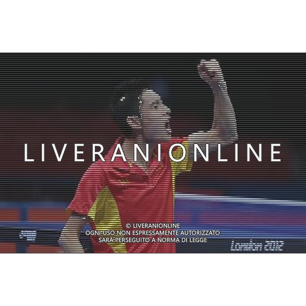 (120902) -- LONDON, Sept. 2, 2012 () -- Feng Panfeng of China celebrates during the Men\'s Singles - Class 3 of the Table Tennis event against Zlatko Kesler of Serbia at the London 2012 Paralympic Games in London, Britain, on Sept. 2, 2012. Feng Panfeng won 3-0 to claim the title. (/Bai Xuefei)(hcs) PHOTOSHOT/AG ALDO LIVERANI SAS - ITALY ONLY -