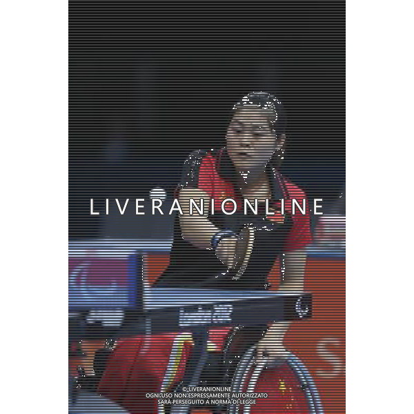 (120903) -- LONDON, Sept. 3, 2012 () -- Zhou Ying of China returns a shot to Borislava Peric-Pankovic of Serbia during the women\'s singles class 4 final at the London 2012 Paralympic Games in London, Britain, Sept. 2, 2012. Zhou Ying won 3-0. (/Bai Xuefei) ©PHOTOSHOT/AGENZIA ALDO LIVERANI SAS - ITALY ONLY - PARALIMPIADI LONDRA 2012