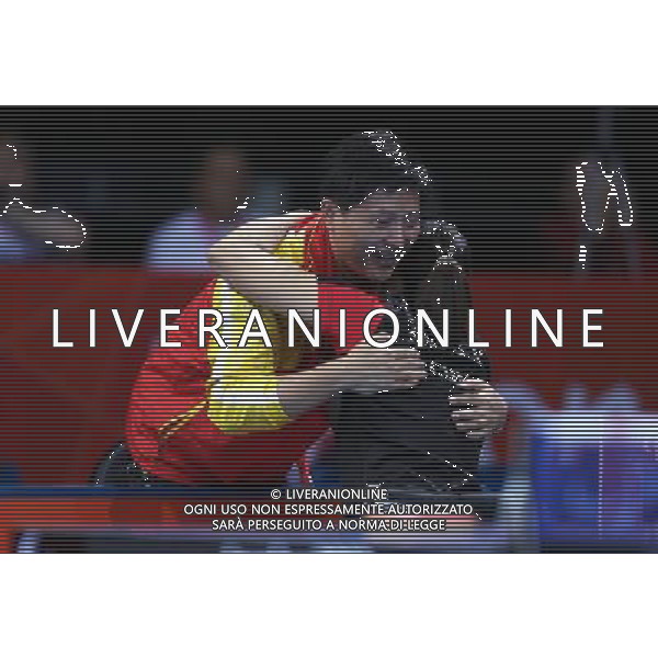 (120903) -- LONDON, Sept. 3, 2012 () -- Zhou Ying (R) of China hugs her coach Heng Xin after winning the women\'s singles class 4 final against Borislava Peric-Pankovic of Serbia at the London 2012 Paralympic Games in London, Britain, Sept. 2, 2012. Zhou Ying won 3-0. (/Bai Xuefei) ©PHOTOSHOT/AGENZIA ALDO LIVERANI SAS - ITALY ONLY - PARALIMPIADI LONDRA 2012