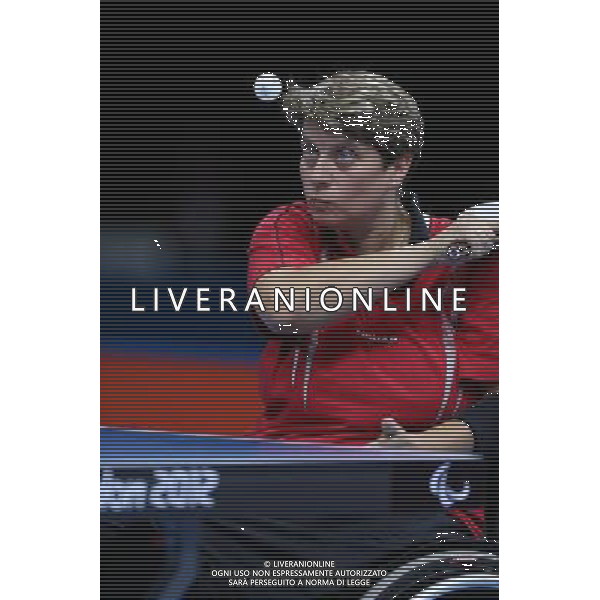 (120903) -- LONDON, Sept. 3, 2012 () -- Borislava Peric-Pankovic of Serbia serves to Zhou Ying of China during the women\'s singles class 4 final at the London 2012 Paralympic Games in London, Britain, Sept. 2, 2012. Zhou Ying won 3-0. (/Bai Xuefei) ©PHOTOSHOT/AGENZIA ALDO LIVERANI SAS - ITALY ONLY - PARALIMPIADI LONDRA 2012