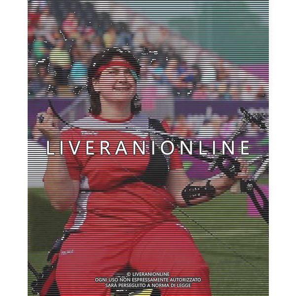 (120904) -- LONDON, Sept. 4, 2012 () -- Milena Olszewska of Poland celebrates after the Archery competition of the Women\'s Individual Recurve - Standing against Javzmaa Byambasuren of Mongolia at the London 2012 Paralympic Games in London, Britain, on Sept. 4, 2012. Olszewska won 6-2 to take the bronze medal. (/Wang Lili) photoshot/AG ALDO LIVERANI SAS - ITALY ONLY - *** Local Caption *** ..