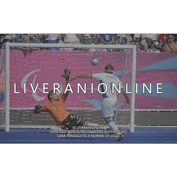 (120904) -- LONDON, Sept. 4, 2012 () -- David Labarre (R) of France shoots during the Pool B third round match of Men\'s Football 5-a-side between France and Turkey at the London 2012 Paralympic Games in London, Britain, on Sept. 4, 2012. France won 1-0. (/Li Jundong) photoshot/AG ALDO LIVERANI SAS - ITALY ONLY - *** Local Caption *** ..