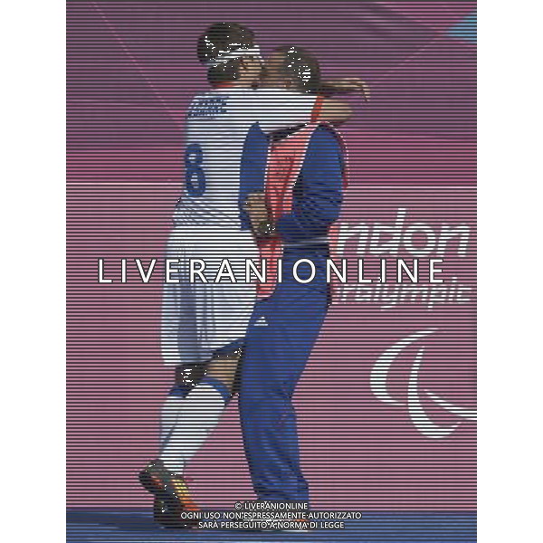 (120904) -- LONDON, Sept. 4, 2012 () -- David Labarre (L) of France hugs his guide after scoring during the Pool B third round match of Men\'s Football 5-a-side between France and Turkey at the London 2012 Paralympic Games in London, Britain, on Sept. 4, 2012. France won 1-0. (/Li Jundong) photoshot/AG ALDO LIVERANI SAS - ITALY ONLY - *** Local Caption *** ..