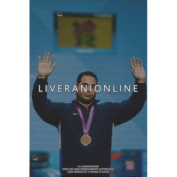 (120904) -- LONDON, Sept. 4, 2012 () -- Metwaly Mathana of Egypt poses during the awarding ceremony of the Men\'s 82.50 kg powerlifting competition at the London 2012 Paralympic Games in London, Britain, on Sept. 4, 2012. Mathana took the bronze medal with 227 kg. (/Cheong Kam Ka) photoshot/AG ALDO LIVERANI SAS - ITALY ONLY - *** Local Caption *** ..