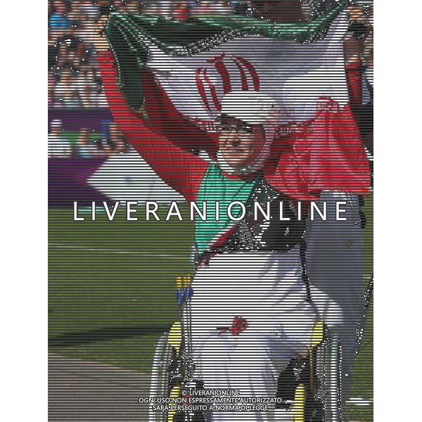 (120904) -- LONDON, Sept. 4, 2012 () -- Zahra Memati of Iran celebrates victory after the Women\'s Individual Recurve - W1/W2 archery competition against Elisabetta Mijno of Italy at the London 2012 Paralympic Games in London, Britain, on Sept. 4, 2012. Memati won 7-3 to take the gold medal. (/Wang Lili) photoshot/AG ALDO LIVERANI SAS - ITALY ONLY - *** Local Caption *** ..