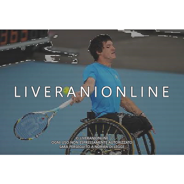 (120905) -- LONDON , Sept. 4, 2012 () -- Gustavo Fernandez of Argentina returns the ball to Takashi Sanada of Japan during the men\'s singles 3rd round match of wheelchair tennis competition at the London 2012 Paralympic Games in London, Britain, on Sept. 4, 2012. Gustavo Fernandez won 2-1 to enter the quarterfinals.(/Chen Yehua) (lm) photoshot/AG ALDO LIVERANI SAS - ITALY ONLY - *** Local Caption *** ..
