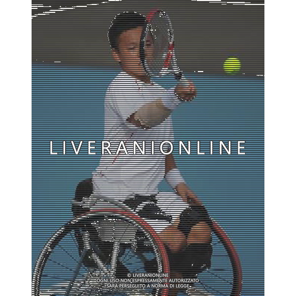 (120905) -- LONDON , Sept. 4, 2012 () -- Takashi Sanada of Japan returns the ball to Gustavo Fernandez of Argentina during the men\'s singles 3rd round match of wheelchair tennis competition at the London 2012 Paralympic Games in London, Britain, on Sept. 4, 2012. Takashi Sanada lost 1-2.(/Chen Yehua) (lm) photoshot/AG ALDO LIVERANI SAS - ITALY ONLY - *** Local Caption *** ..