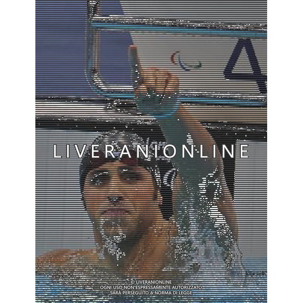 (120905) -- LONDON , Sept. 4, 2012 () -- Justin Zook of the United States celebrates for victory after winning the men\'s 100m backstroke S10 final of swimming competition at the London 2012 Paralympic Games in London, Britain, on Sept. 4, 2012. Justin Zook won the gold and created the new world record with 1 minute and 00.01 seconds.(/Yang Shiyao) (lm) photoshot/AG ALDO LIVERANI SAS - ITALY ONLY - *** Local Caption *** ..