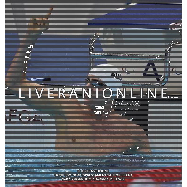 (120905) -- LONDON , Sept. 4, 2012 () -- Brenden Hall of Australia celebrates for victory after winning the men\'s 400m freestyle S9 final of swimming competition at the London 2012 Paralympic Games in London, Britain, on Sept. 4, 2012. Brenden Hall won the gold and created the new world record with 4 minute and 10.88 seconds.(/Yang Shiyao) (lm) photoshot/AG ALDO LIVERANI SAS - ITALY ONLY - *** Local Caption *** ..
