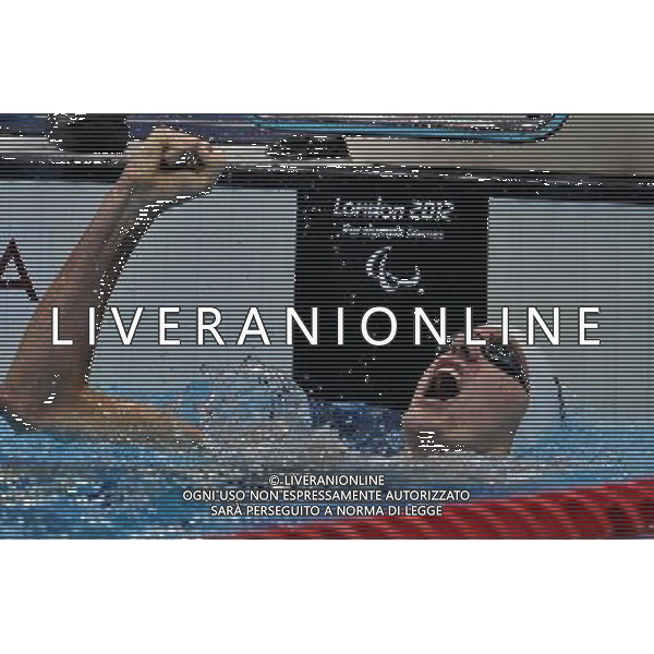 (120905) -- LONDON , Sept. 4, 2012 () -- Brenden Hall of Australia celebrates for victory after winning the men\'s 400m freestyle S9 final of swimming competition at the London 2012 Paralympic Games in London, Britain, on Sept. 4, 2012. Brenden Hall won the gold and created the new world record with 4 minute and 10.88 seconds.(/Yang Shiyao) (lm) photoshot/AG ALDO LIVERANI SAS - ITALY ONLY - *** Local Caption *** ..