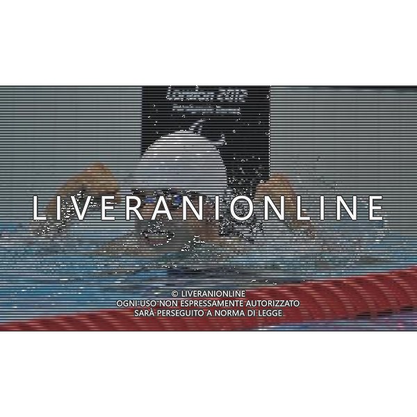 (120905) -- LONDON , Sept. 4, 2012 () -- Konstantin Lisenkov of Russia celebrates for victory after winning the men\'s 100m backstroke S8 final of swimming competition at the London 2012 Paralympic Games in London, Britain, on Sept. 4, 2012. Konstantin Lisenkov won the gold with 1 minute and 05.43 seconds.(/Yang Shiyao) (lm) photoshot/AG ALDO LIVERANI SAS - ITALY ONLY - *** Local Caption *** ..