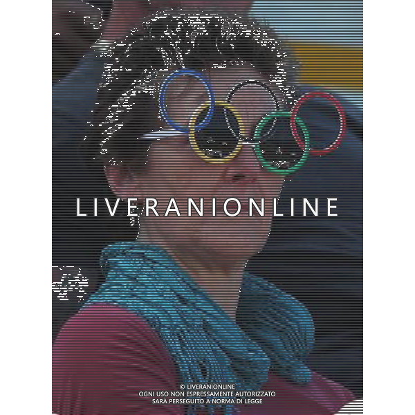 (120905) -- LONDON , Sept. 4, 2012 () -- A woman wearing sunglasses of Olympic Rings watches the match during the archery competition at the London 2012 Paralympic Games in London, Britain, on Sept. 4, 2012. (/Wang Lili) (lm) photoshot/AG ALDO LIVERANI SAS - ITALY ONLY - *** Local Caption *** ..