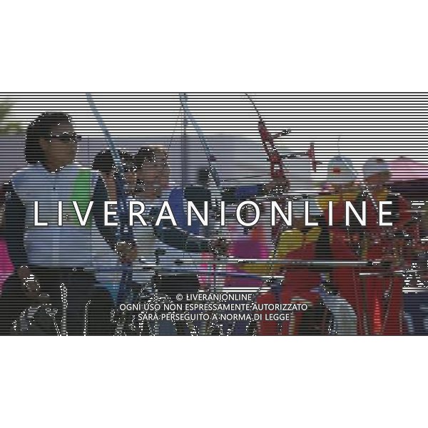 (120905) -- LONDON , Sept. 5, 2012 () -- Kim Ran Sook (3rd L), Ko Hee Sook (2nd L) and Lee Hwa Sook (1st L) of South Korea\'s team compete during the women\'s team recurve open final of archery competition at the London 2012 Paralympic Games in London, Britain, on Sept. 5, 2012. Team South Korea won the gold medal. (/Wang Lili) (lm) PHOTOSHOT-AG ALDO LIVERANI SAS - ITALY ONLY