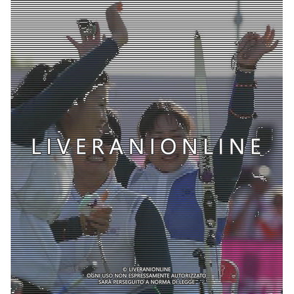 (120905) -- LONDON , Sept. 5, 2012 () -- Kim Ran Sook (R), Ko Hee Sook (C) and Lee Hwa Sook of South Korea\'s team greet the audience after winning the women\'s team recurve open final of archery competition at the London 2012 Paralympic Games in London, Britain, on Sept. 5, 2012. Team South Korea won the gold medal. (/Wang Lili) (lm) PHOTOSHOT-AG ALDO LIVERANI SAS - ITALY ONLY
