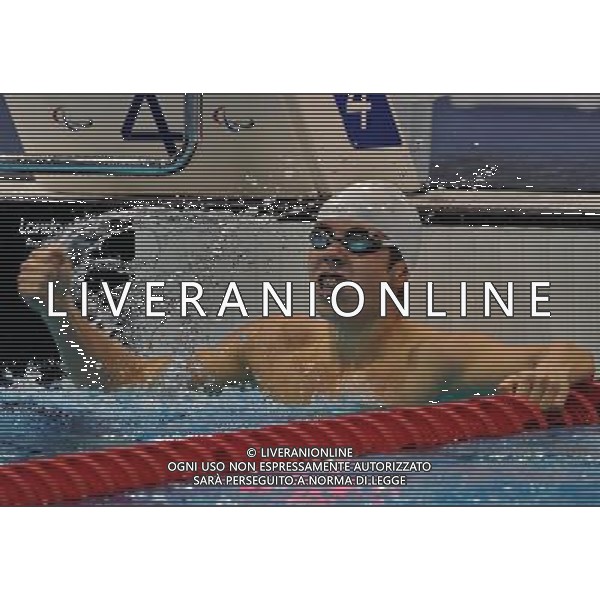 (120905) -- LONDON , Sept. 5, 2012 () -- Aleksandr Nevolin-Svetov of Russia celebrates for victory after winning the men\'s 100m backstroke S12 final of swimming competition at the London 2012 Paralympic Games in London, Britain, on Sept. 5, 2012. Aleksandr Nevolin-Svetov won the gold and created the new world record with 59.35 seconds. (/Yang Shiyao) (lm) PHOTOSHOT-AG ALDO LIVERANI SAS - ITALY ONLY