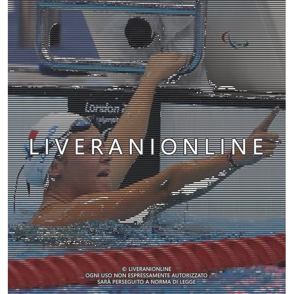 (120905) -- LONDON , Sept. 5, 2012 () -- Elodie Lorandi of France reacts after winning the women\'s 400m freestyle S10 final of swimming competition at the London 2012 Paralympic Games in London, Britain, on Sept. 5, 2012. Elodie Lorandi won the gold with 4 minutes and 34.55 seconds. (/Yang Shiyao) (lm) PHOTOSHOT-AG ALDO LIVERANI SAS - ITALY ONLY