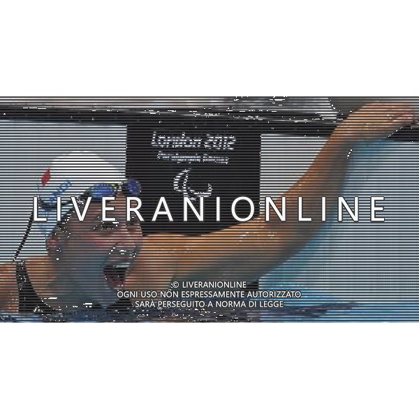 (120905) -- LONDON , Sept. 5, 2012 () -- Elodie Lorandi of France reacts after winning the women\'s 400m freestyle S10 final of swimming competition at the London 2012 Paralympic Games in London, Britain, on Sept. 5, 2012. Elodie Lorandi won the gold with 4 minutes and 34.55 seconds. (/Yang Shiyao) (lm) PHOTOSHOT-AG ALDO LIVERANI SAS - ITALY ONLY