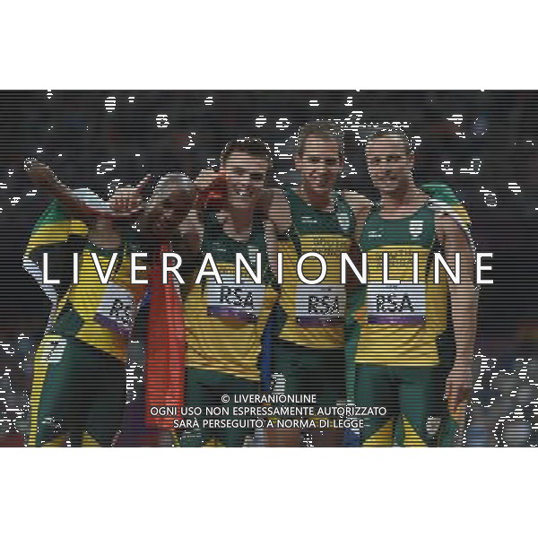 (120906) -- LONDON, Sept. 6, 2012 () -- Players of South Africa celebrate after men\'s T42/T46 4x100m relay final at the London 2012 Paralympic Games in London, Britain, on Sept. 5, 2012. Team South Africa won the gold and created the new world record with 41.78 seconds. (/Cheong Kam Ka) (lm) PHOTOSHOT-AG ALDO LIVERANI SAS - ITALY ONLY