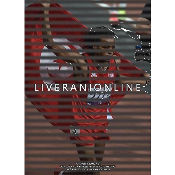 (120906) -- LONDON , Sept. 6, 2012 () -- Abderrahim Zhiou of Tunisia celebrates for victory after winning the men\'s 800m T12 final of athletics competition at the London 2012 Paralympic Games in London, Britain, on Sept. 5, 2012. Abderrahim Zhiou won the gold with 1 minute and 56.42 seconds. (/Wang Haofei) (lm) PHOTOSHOT-AG ALDO LIVERANI SAS - ITALY ONLY