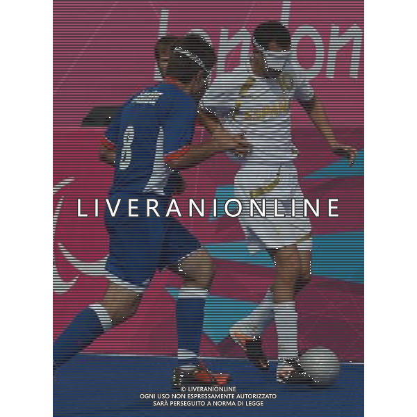 (120906) -- LONDON, Sept. 6, 2012 () -- Labarre David of France vies the ball with Haddauirabll Youssef of Spain during the semifinal of Men\'s Football 5-a-side at the London 2012 Paralympic Games in London, Britain, on Sept. 6, 2012. France won 2-0. (/Li Xiaoguo) (hcs) PHOTOSHOT/AG ALDO LIVERANI SAS - ITALY ONLY -