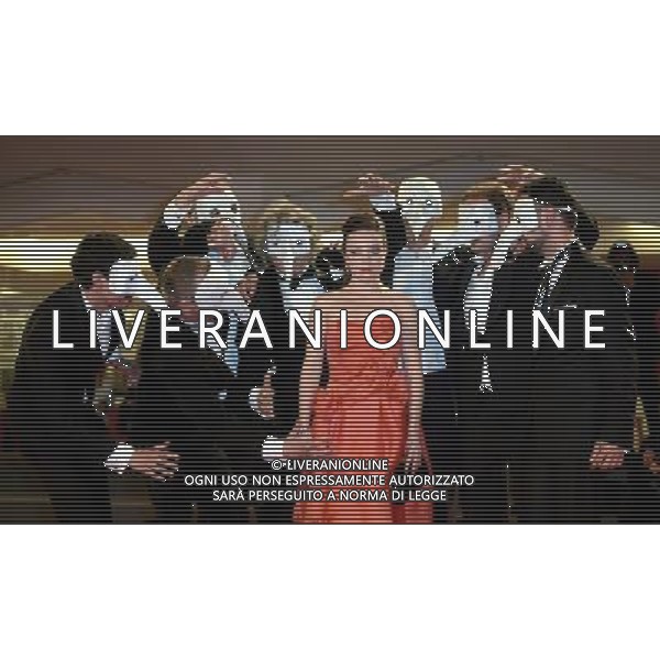 (120906) -- VENICE, Sept. 6, 2012 () -- Actress Aurelia Poirier (C) poses at the red carpet for the premiere of the film \'La Cinquieme Saison\' at the 69th Venice International Film Festival in Venice, Italy, late Sept. 6, 2012. (/Wang Qingqin) /photoshot/AG ALDO LIVERANI SAS - ITALY ONLY -