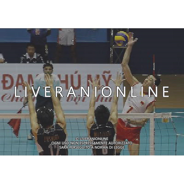 (120906) -- VINH PHUC, Sept. 6, 2012 () -- Zhong Weijun (1st R) of China spikes during a match of the 3rd Asian Volleyball Confederation (AVC) Cup for men against Japan in Vietnam\'s northern Vinh Phuc Province, on Sept. 6, 2012. China won 3-0. (/Hu Ruyi) (hy) PHOTOSHOT/AG ALDO LIVERANI SAS ITALY ONLY PHOTOSHOT/AG ALDO LIVERANI SAS ITALY ONLY