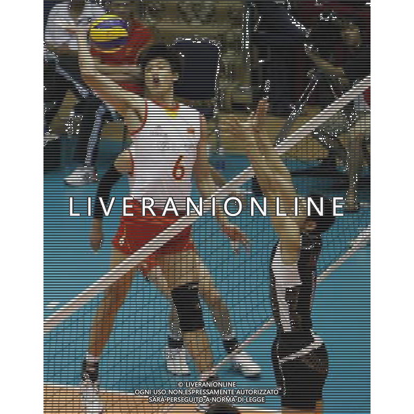 (120906) -- VINH PHUC, Sept. 6, 2012 () -- Liang Chunlong of China spikes during the 3rd Asian Volleyball Confederation (AVC) Cup for men against Japan in Vietnam\'s northern Vinh Phuc Province, on Sept. 6, 2012. China won 3-0. (/Hu Ruyi) (hy) PHOTOSHOT/AG ALDO LIVERANI SAS ITALY ONLY PHOTOSHOT/AG ALDO LIVERANI SAS ITALY ONLY