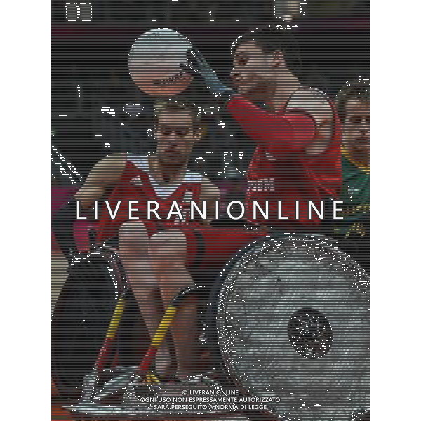 (120907) -- LONDON, Sept. 7, 2012 () -- Mertens lars (C) of Belgium control the ball during the mixed wheelchair rugby Pool Phase Group B match against Australia at the London 2012 Paralympic Games in London, Britain, on Sept. 7, 2012. Belgium lost the match 43-58.(/Wang Haofei) (zc) PHOTOSHOT/AG ALDO LIVERANI SAS ITALY ONLY