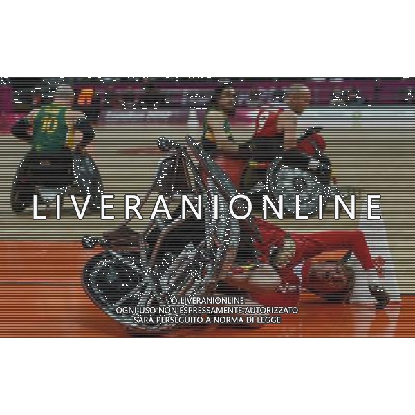 (120907) -- LONDON, Sept. 7, 2012 () -- Vanacker Bob (Front) of Belgium falls during the mixed wheelchair rugby Pool Phase Group B match against Australia at the London 2012 Paralympic Games in London, Britain, on Sept. 7, 2012. Belgium lost the match 43-58.(/Wang Haofei) (zc) PHOTOSHOT/AG ALDO LIVERANI SAS ITALY ONLY