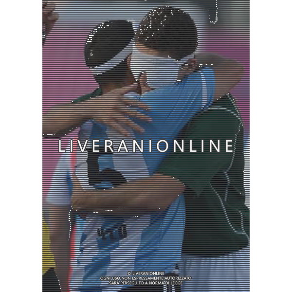 (120907) -- LONDON, Sept. 7, 2012 () -- Cassio Lopes dos Reis (R) of Brazil hugs Silvio Velo of Argentina after the men\'s football 5-a-side semifinal at the London 2012 Paralympic Games in London, Britain, on Sept. 6, 2012. (/Li Jundong) PHOTOSHOT/AG ALDO LIVERANI SAS - ITALY ONLY -