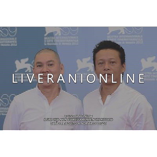 (120908) -- VENICE, Sept. 8, 2012 () -- Director Tsai Ming-liang (L) and actor Lee Kang-sheng of China\'s Taiwan pose at the photocall for the film \'Jingang Jing (Diamond Sutra)\' at the 69th Venice International Film Festival in Venice, Italy, Sept. 8, 2012. (/Wang Qingqin) (zjl) photoshot/AG ALDO LIVERANI SAS - ITALY ONLY -