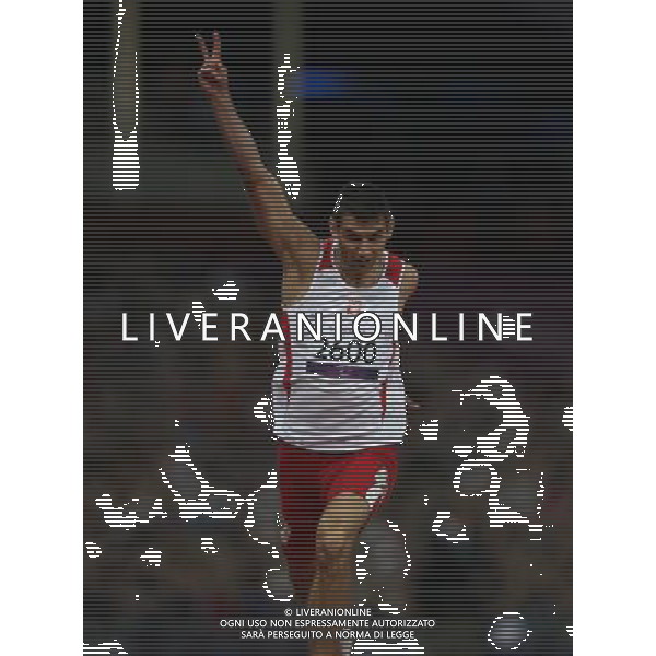 (120909) -- LONDON, Sept. 9, 2012 () -- Mateusz Michalski of Poland celebrates for victory after winning the men\'s 200m T12 final of athletics competition at the London 2012 Paralympic Games in London, Britain, on Sept. 8, 2012. Mateusz Michalski won the gold medal and created the new world record with 21.56 seconds.(/Wang Lili) (lm) PHOTOSHOT/AG ALDO LIVERANI SAS - ITALY ONLY -