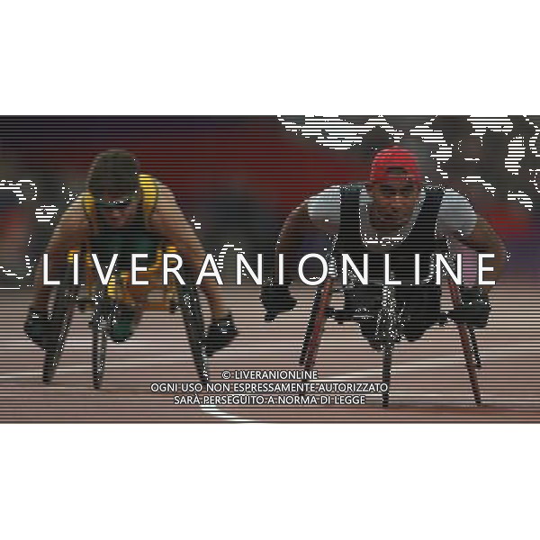 (120909) -- LONDON, Sept. 9, 2012 () -- Walid Ktila (R) of Tunisia competes during the men\'s 100m T34 final of athletics competition at the London 2012 Paralympic Games in London, Britain, on Sept. 8, 2012. Walid Ktila took the gold medal with 15.91 seconds.(/Wang Lili) (lm) PHOTOSHOT/AG ALDO LIVERANI SAS - ITALY ONLY -